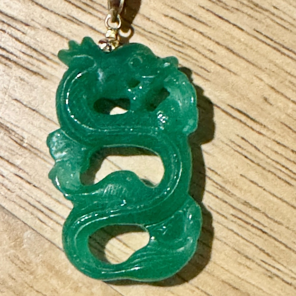 Jade dragon pendant on 14k hang